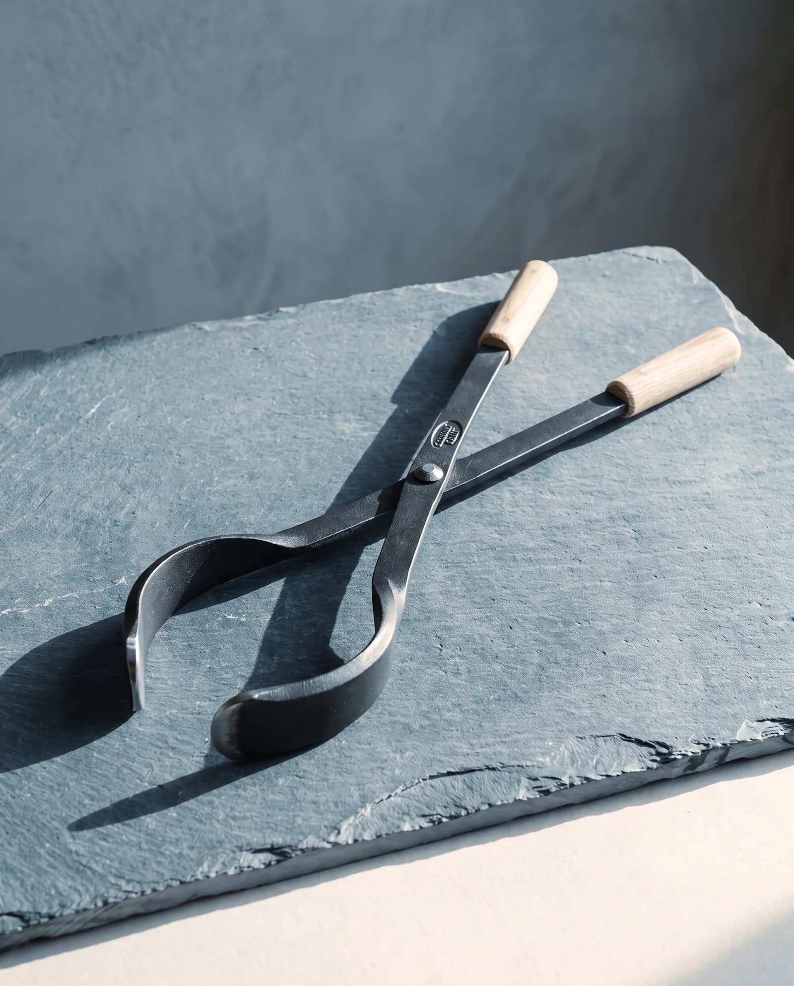 Log Tongs — Scissor action, 26 inches, forged jaws.