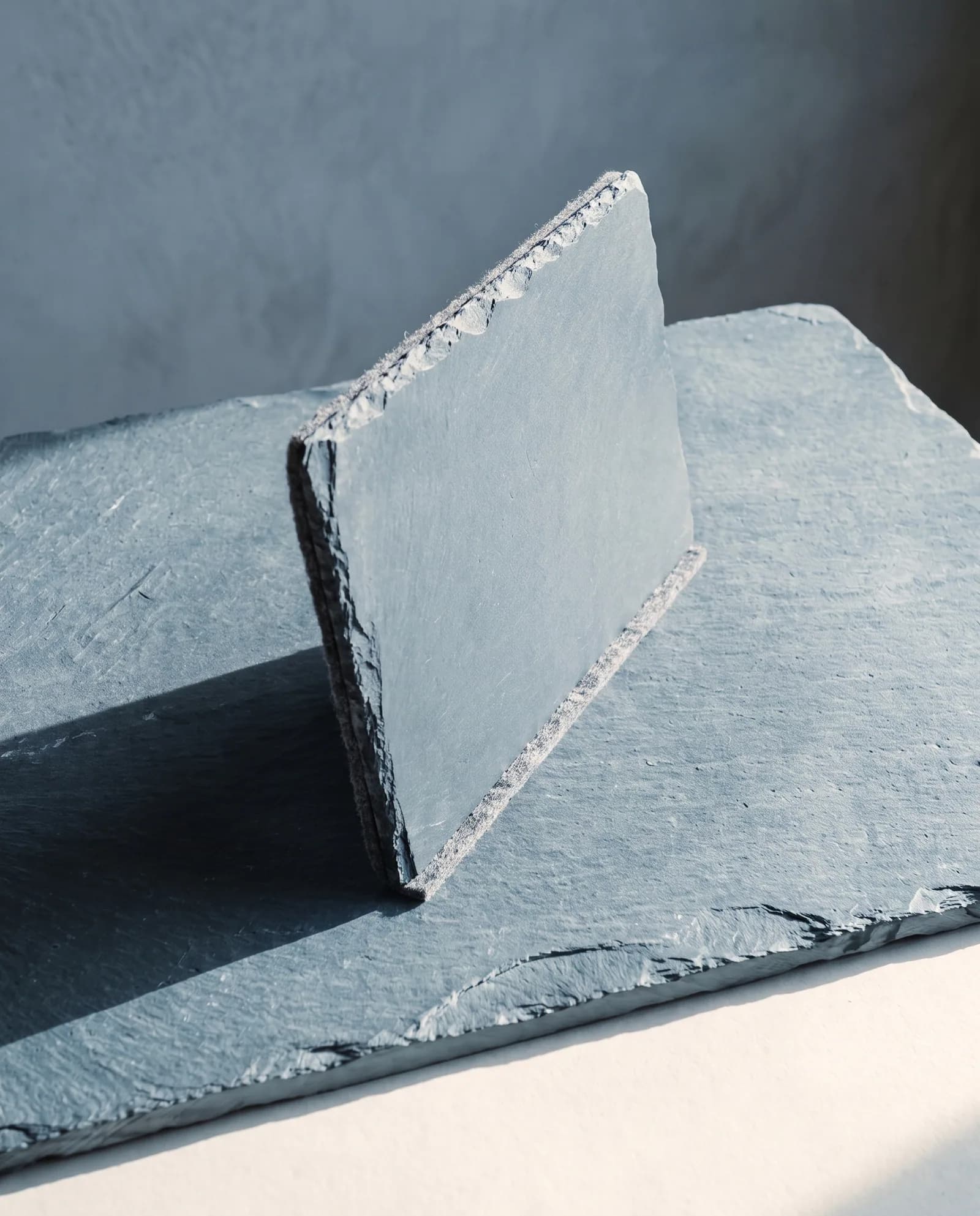 Riven Slate Board — Welsh slate, 16 × 12 inches, felted base.