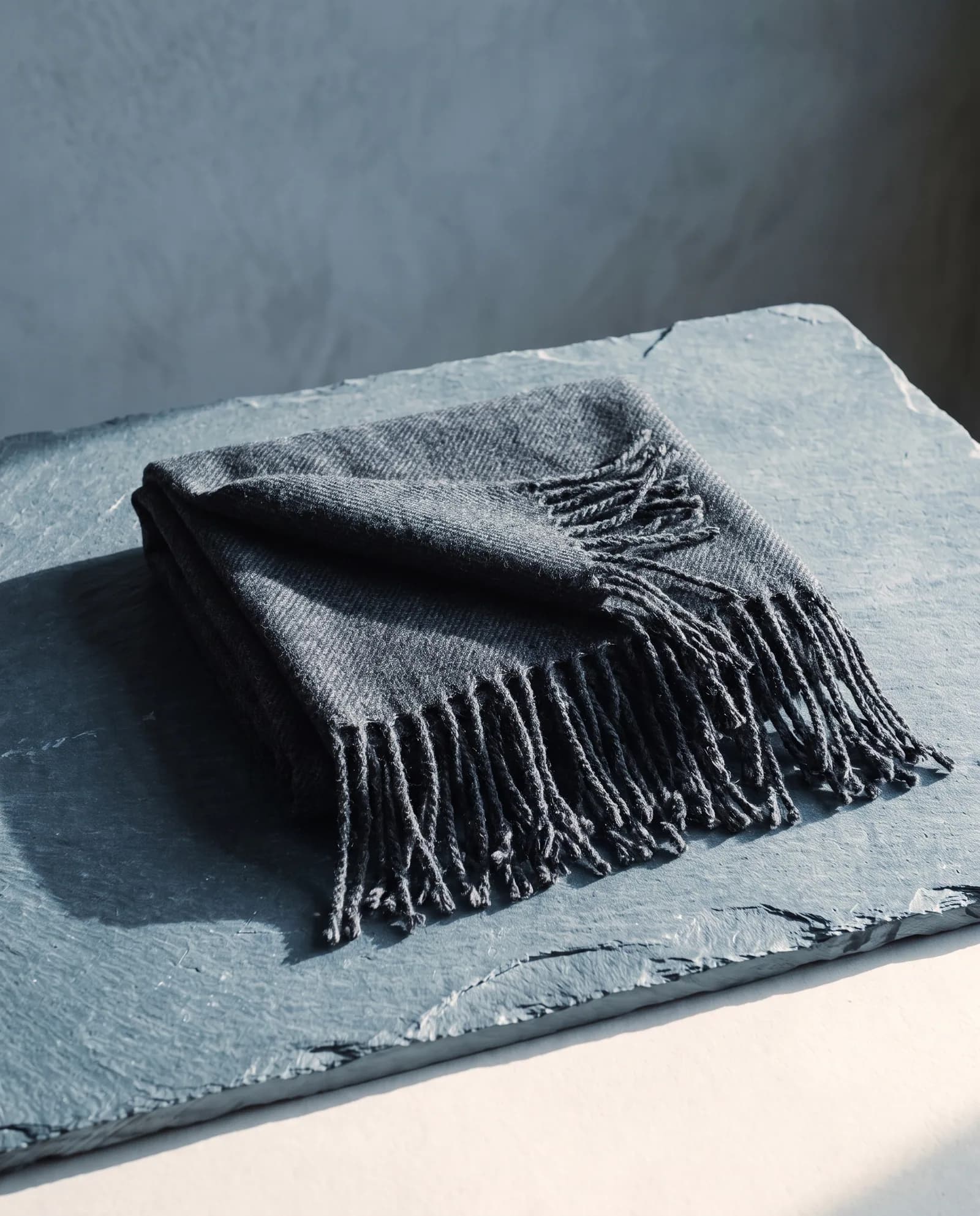 Heavyweight Wool Throw — Twill weave, charcoal, fringed.